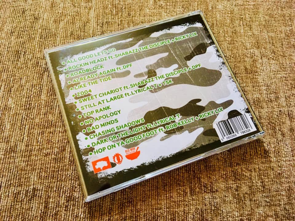Original Reds Crowns and Camo rear cover with camouflage and track list