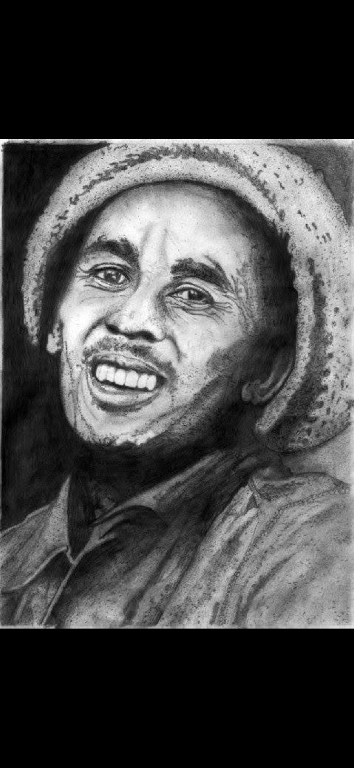 Hand-drawn portrait by Daniel Hornby of a smiling man wearing a knitted hat, with carefully shaded facial features and clothing